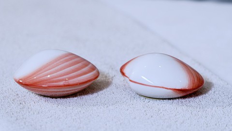 Heat massage with self-warming massage shells/LavaShells